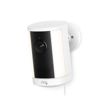 Ring Spotlight Camera Plus Plug-in white with adjustable mounting bracket, shown against a clean background