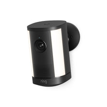 Black Ring Spotlight Camera Plus battery with adjustable mounting bracket, shown against a clean background.