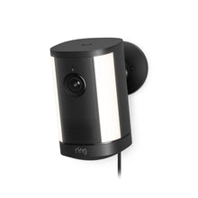 Ring Spotlight Camera Plus Plug-in black with adjustable mounting bracket, shown against a clean background